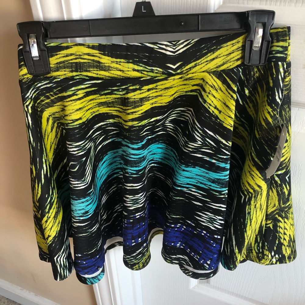Skater skirt with black, neon green, navy blue, and turquoise